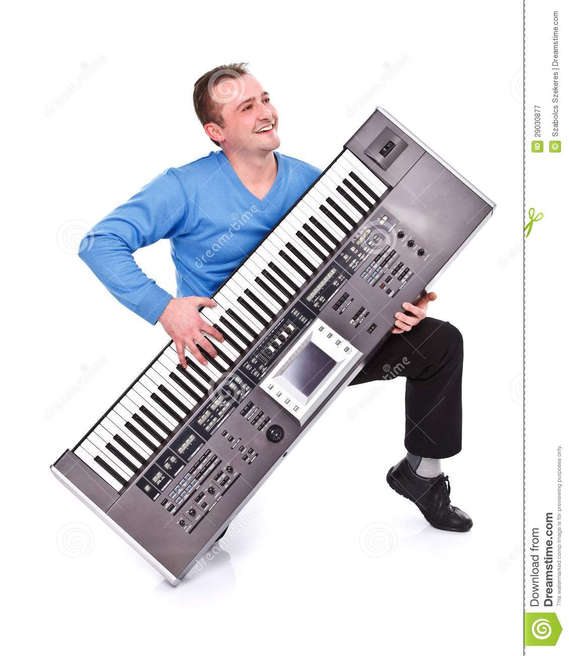 happy-man-playing-synthesizer-29030877.jpg